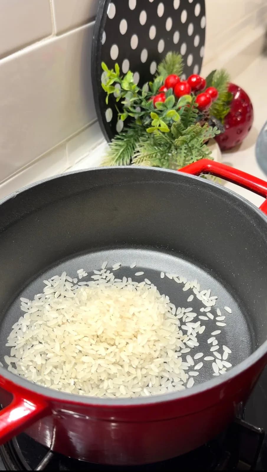 rice cooking in a saucepan for traditional Turkish baked rice pudding