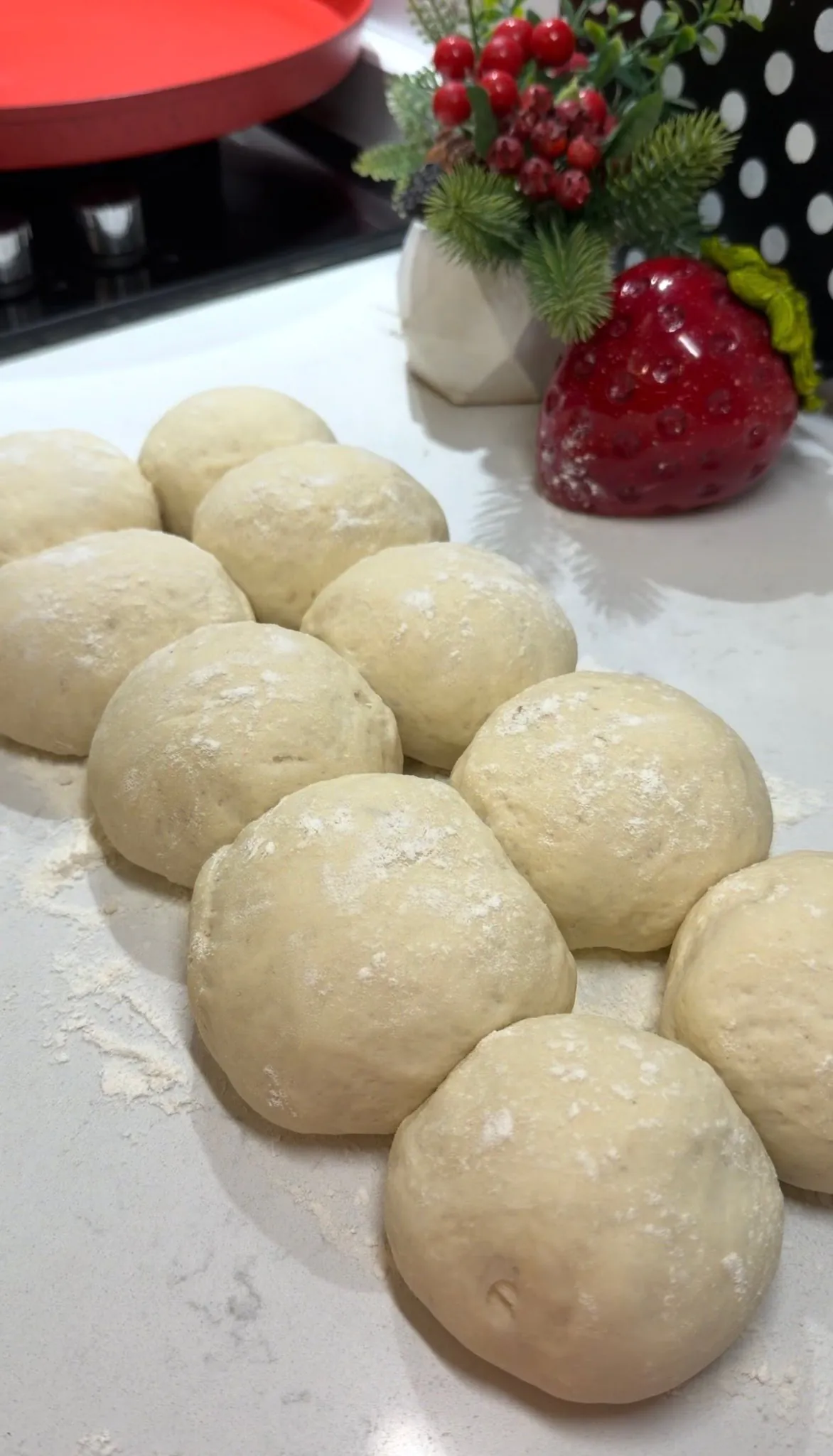 Balloon flatbread cooking and beginning to puff in a hot pan