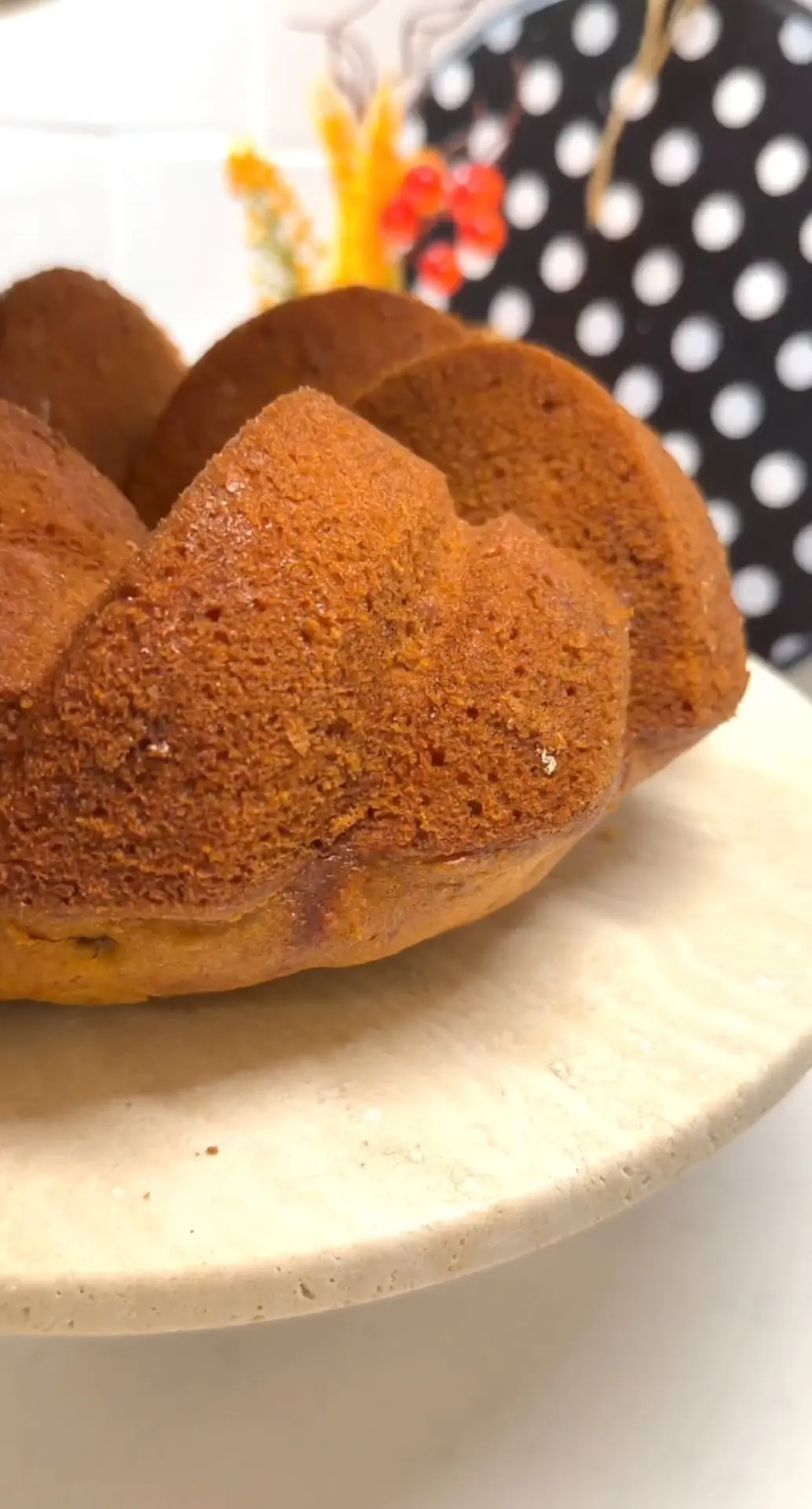 Slice of moist carrot cinnamon walnut cake