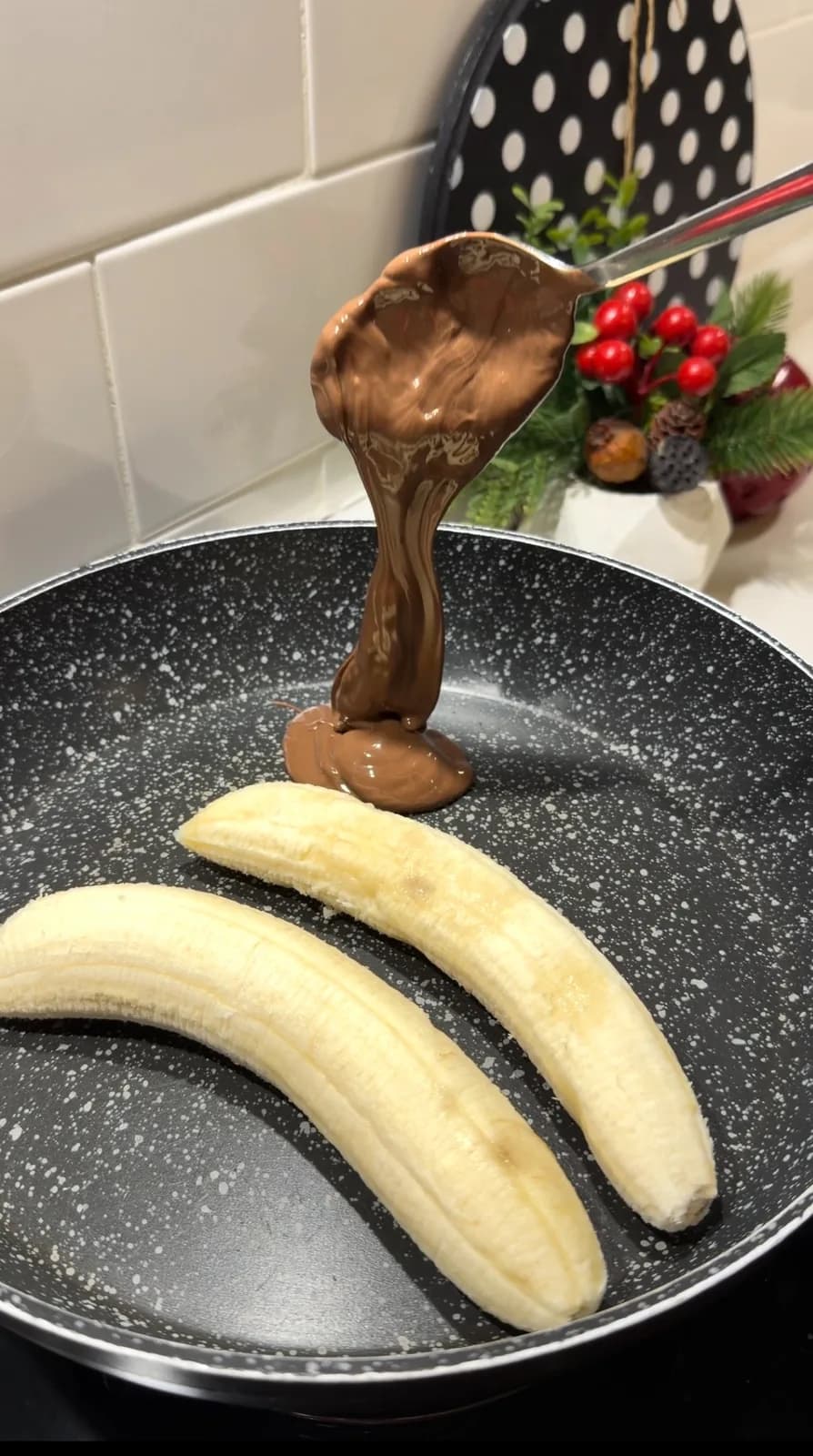 bananas and chocolate spread prepared for no-oven chocolate banana cake