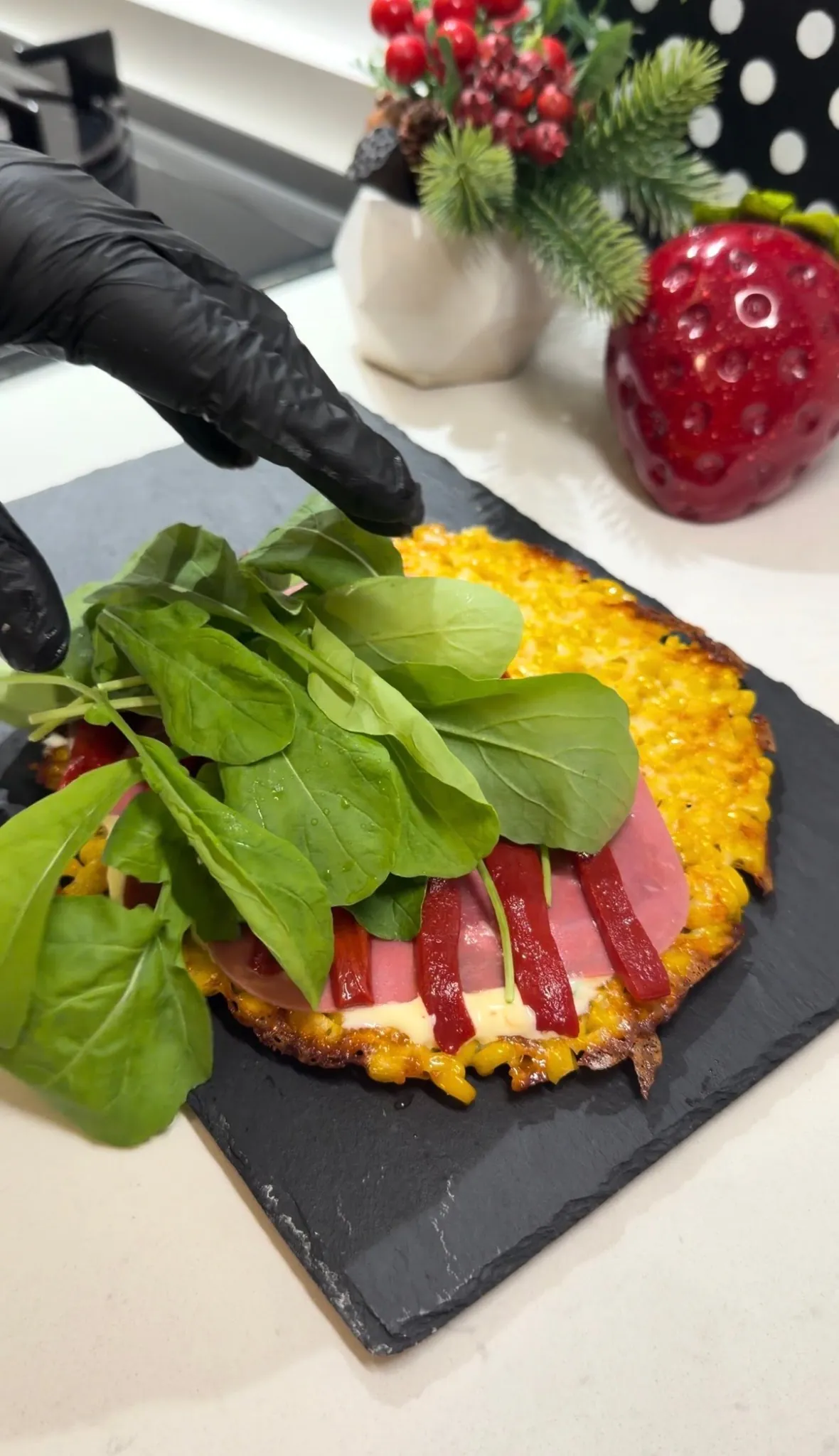 Baked corn sandwich filled with fresh arugula roasted peppers and ham