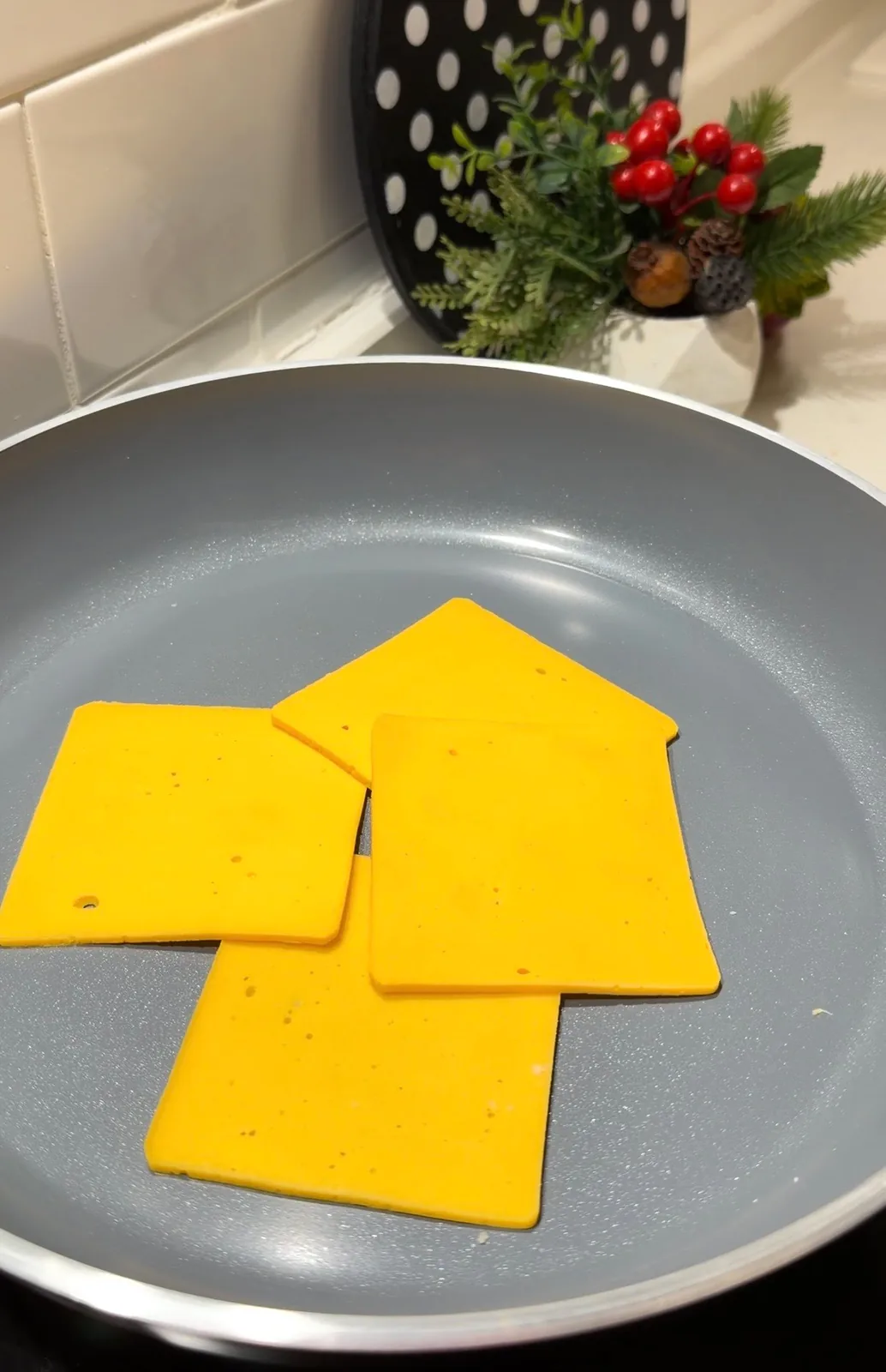 cheddar cheese melting in a pan for creamy cheesy noodles