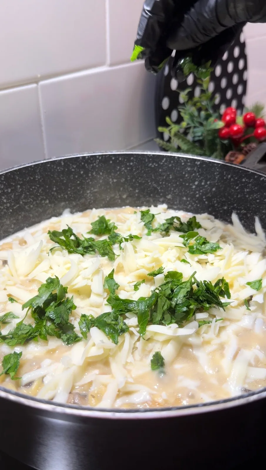 creamy mushroom orzo with melted cheese and sliced mushrooms served on a plate