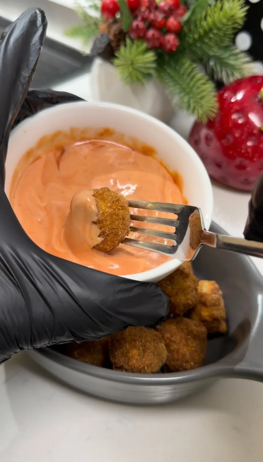 crispy fried olive served with creamy spicy dipping sauce