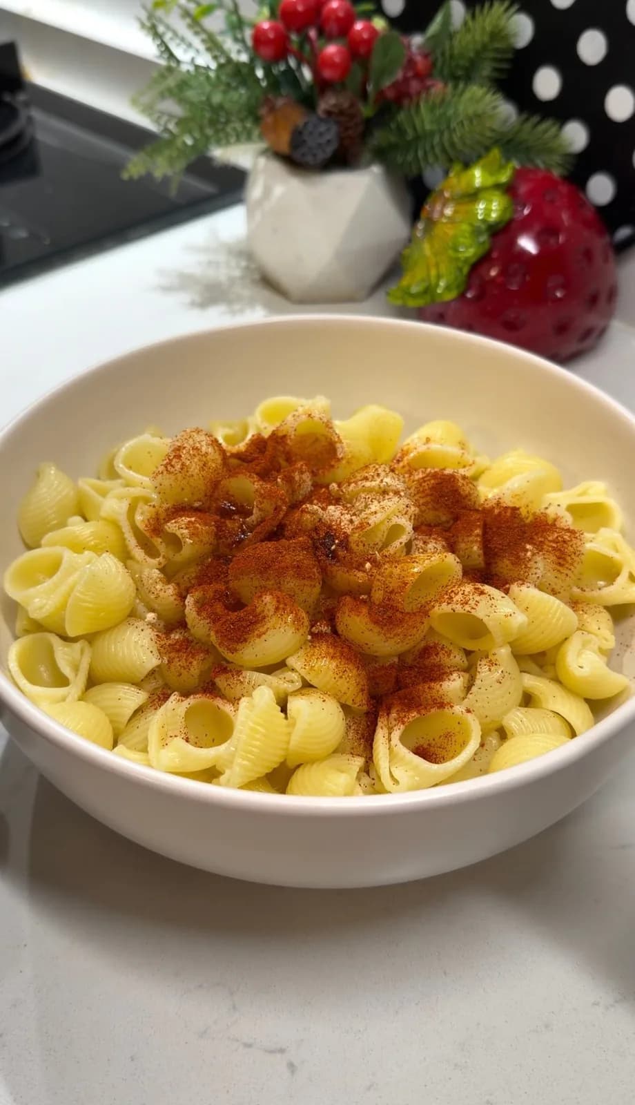 cooked pasta seasoned with spices before baking