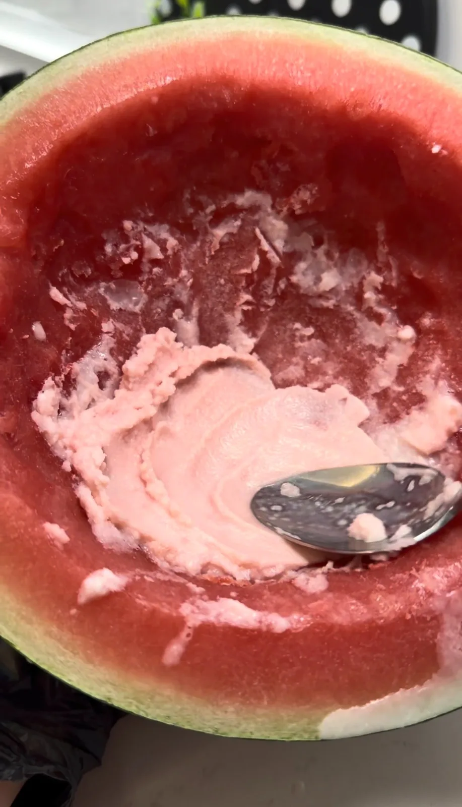 creamy homemade watermelon ice cream blended inside a watermelon