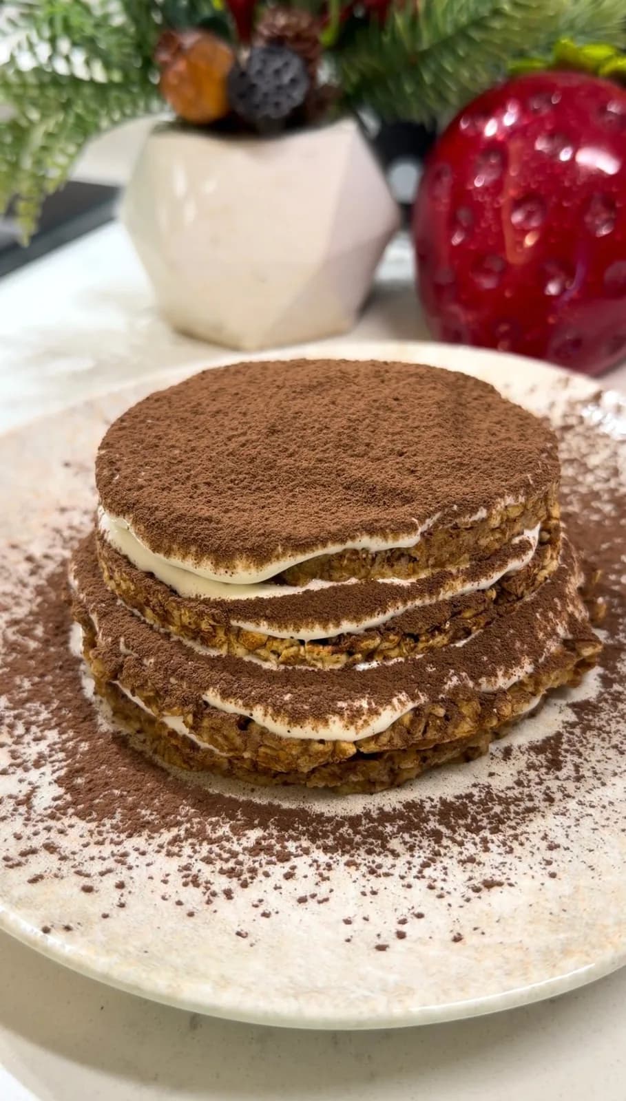fit tiramisu layered with labneh cream and dusted with cocoa powder