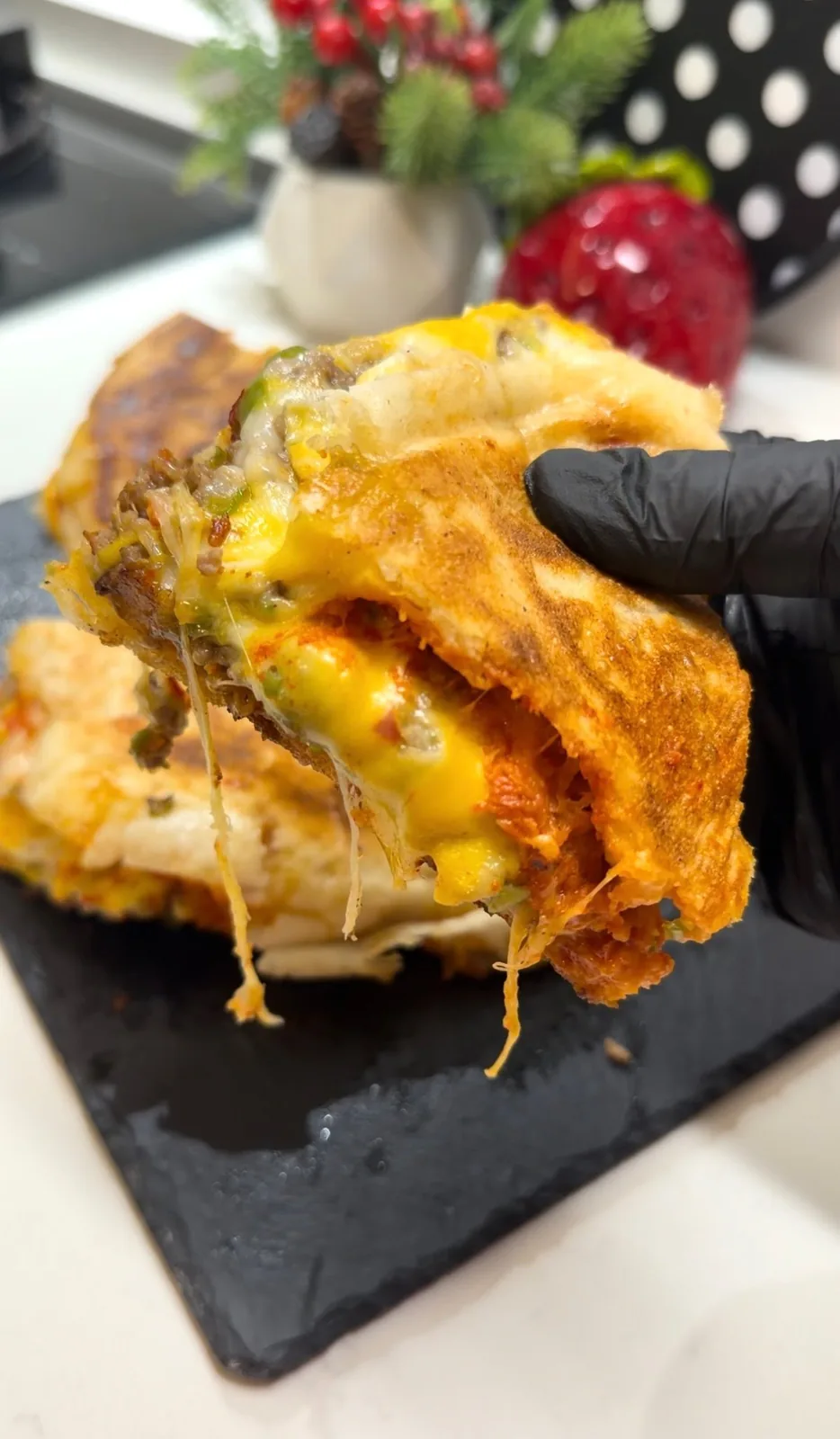 golden toasted Turkish flatbread burger filled with seasoned beef and melted cheese