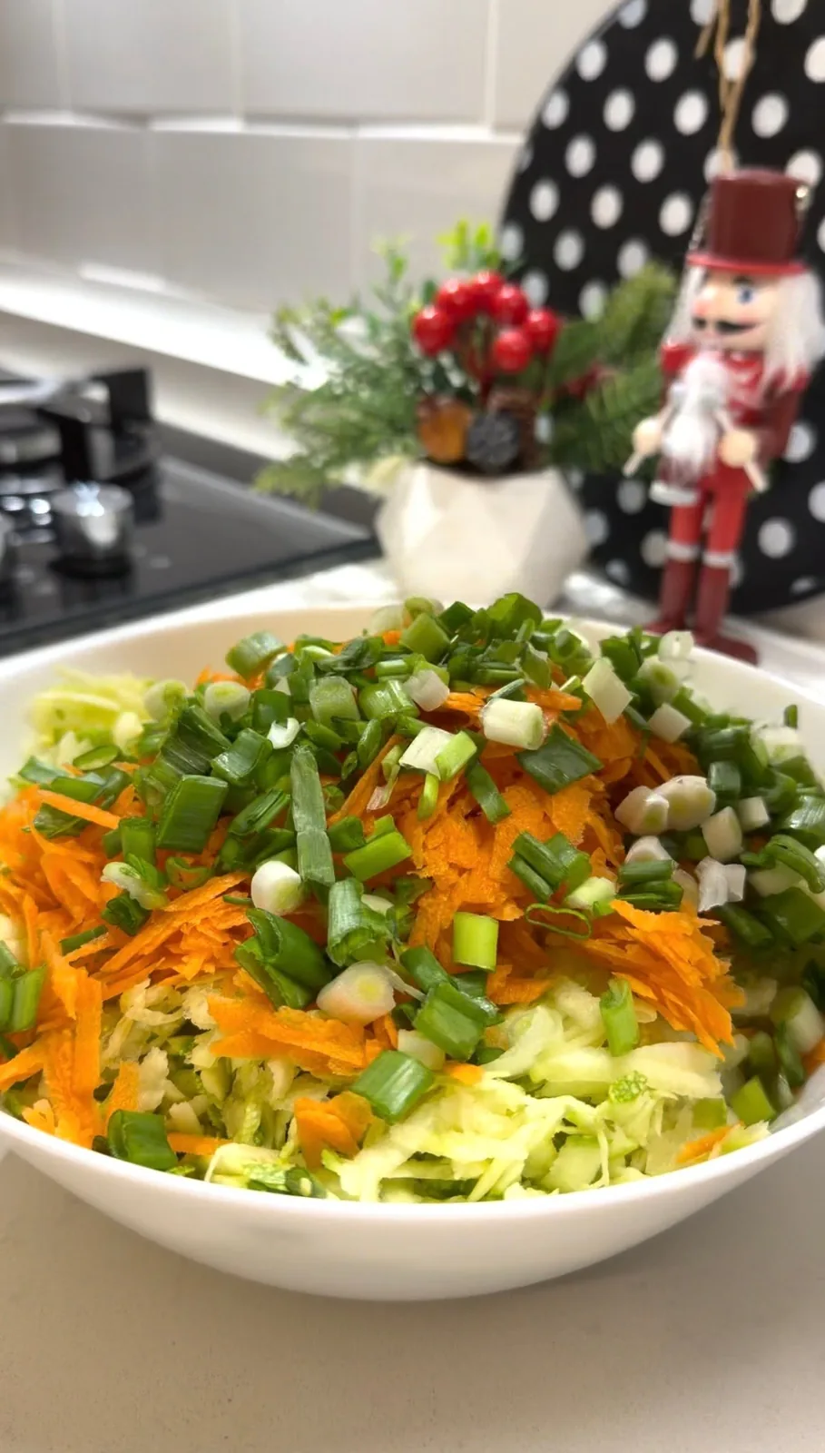 chopped green onions added to grated zucchini and carrots for mucver