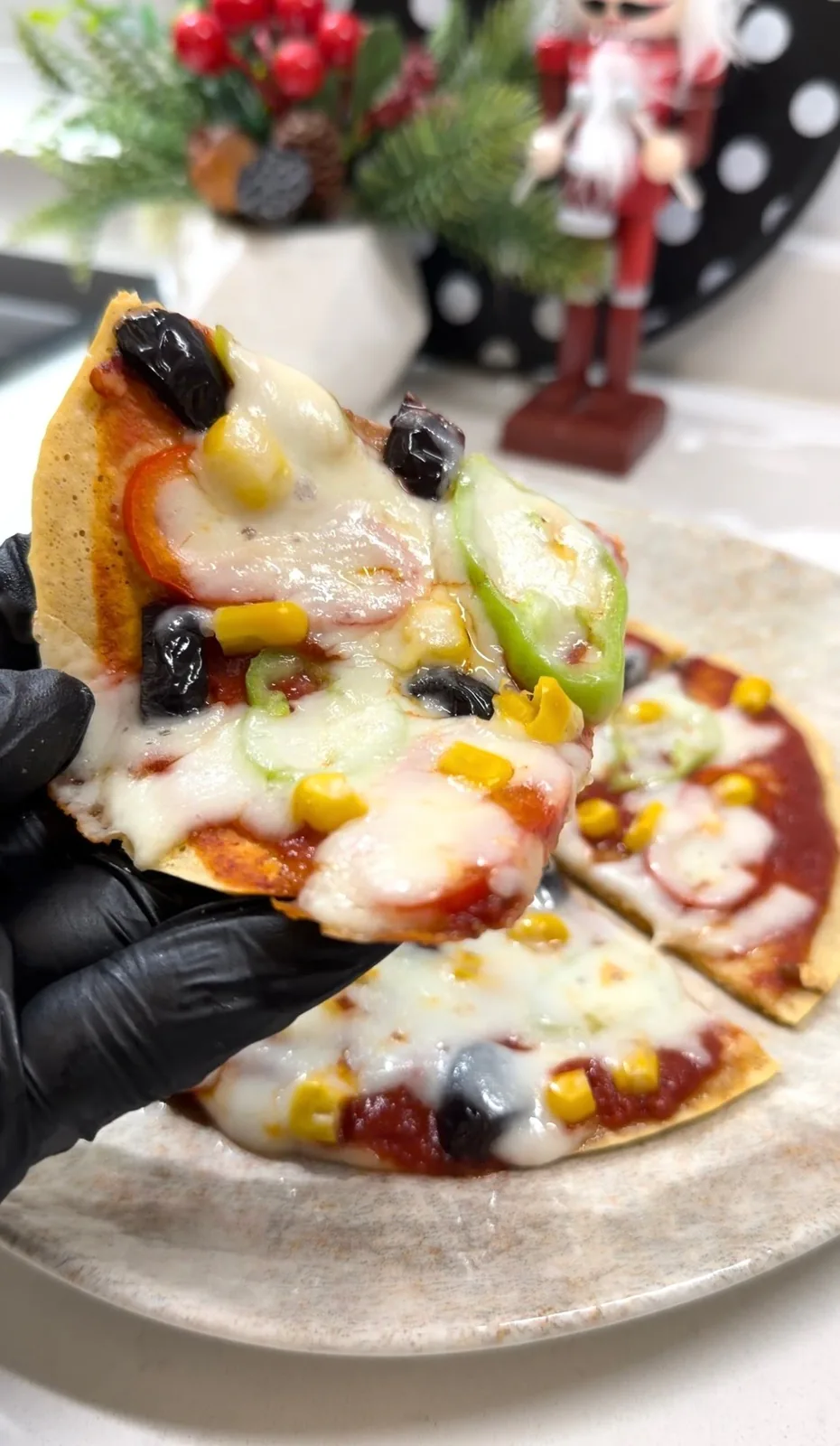 healthy oat pizza cooking in a pan until cheese melts