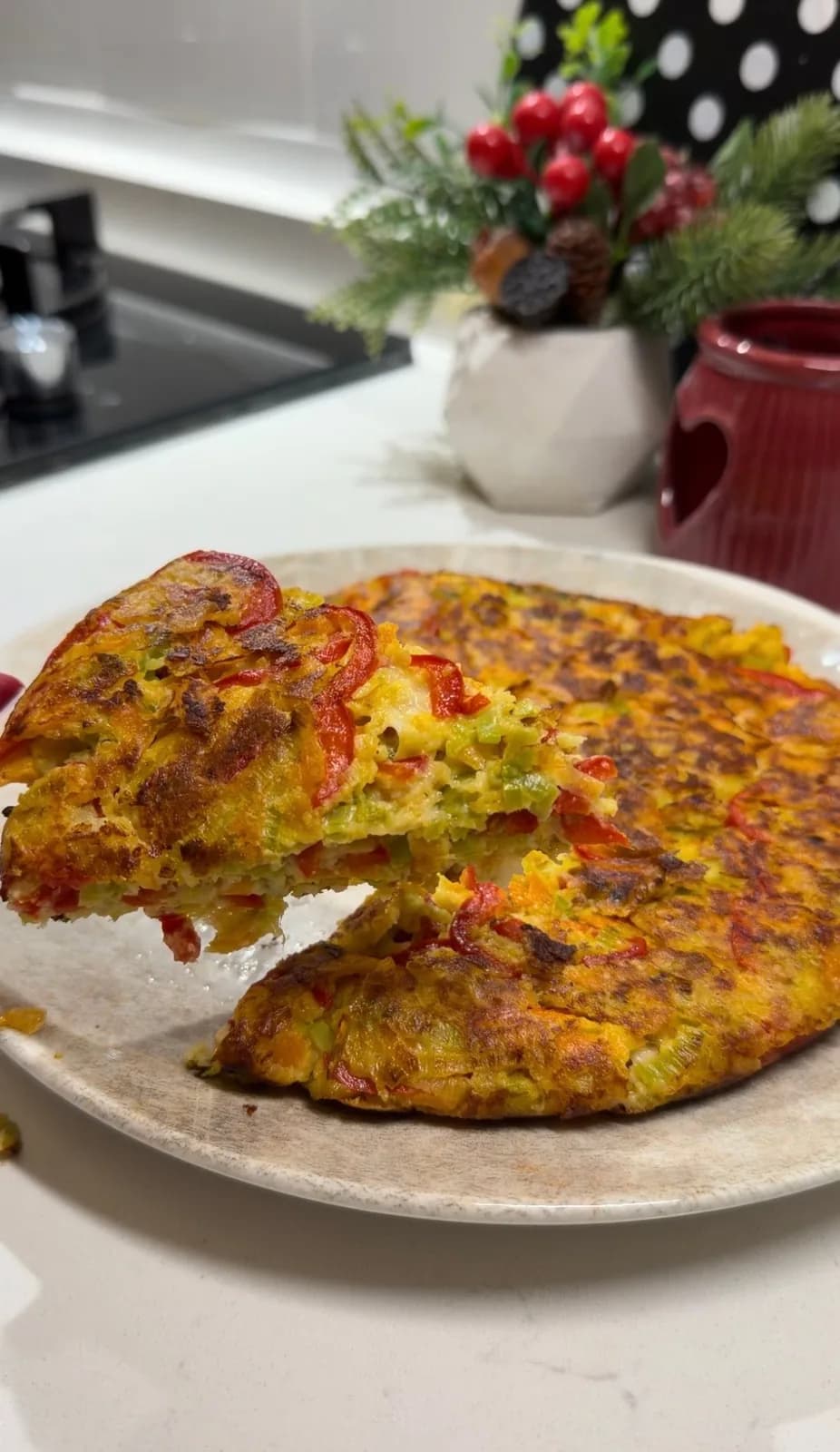 golden healthy vegetable pancake cut into wedges and served warm