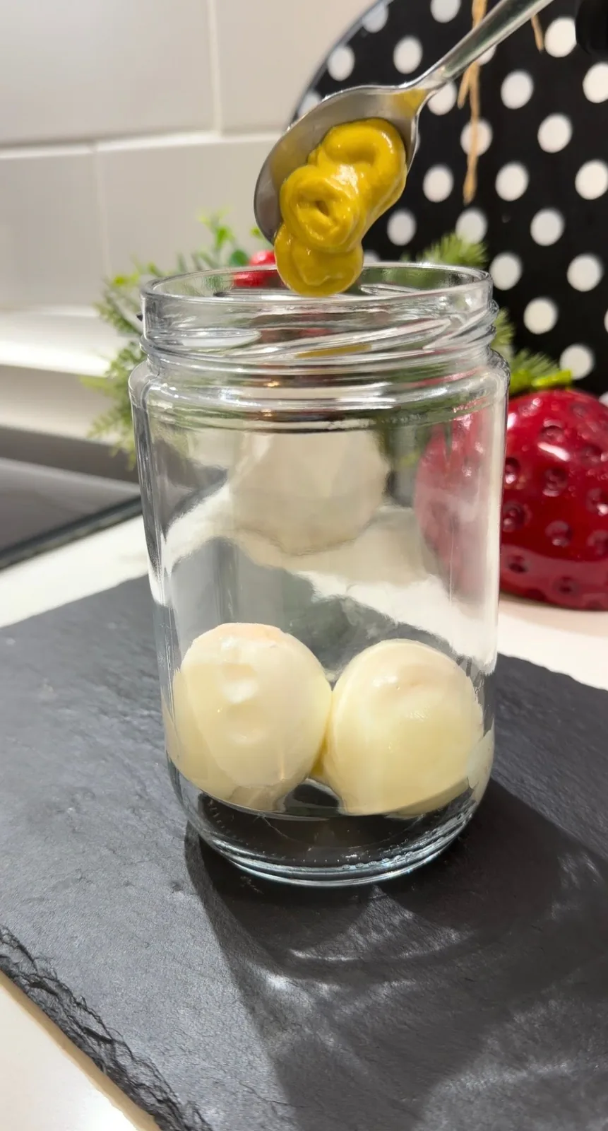 Boiled eggs in a glass jar for homemade mayonnaise