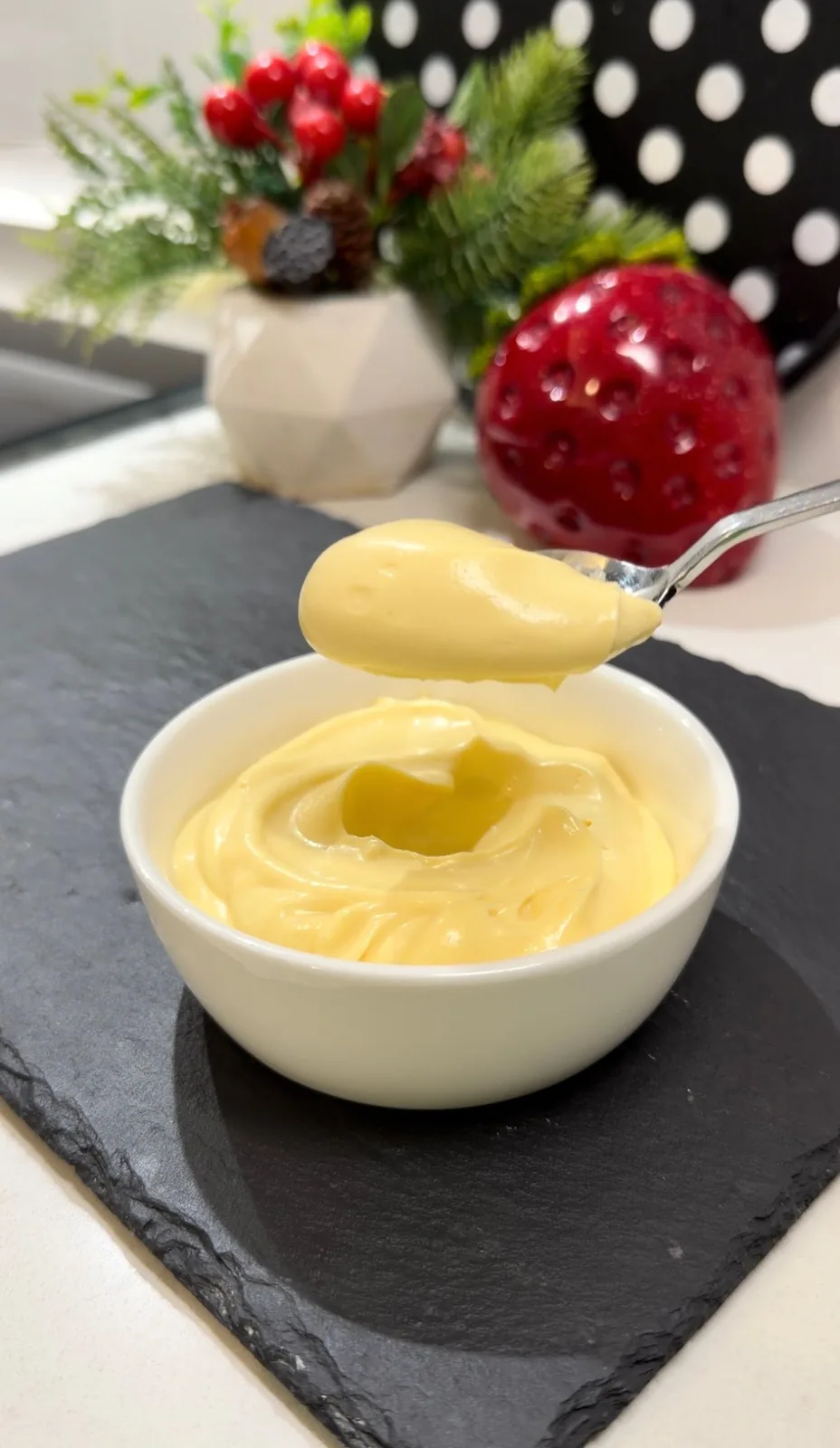 Thick and creamy homemade mayonnaise lifted with a spoon