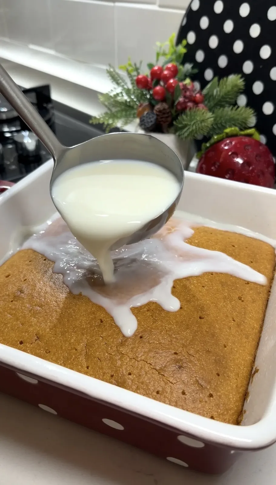 cold milk syrup poured over hot baked semolina cake