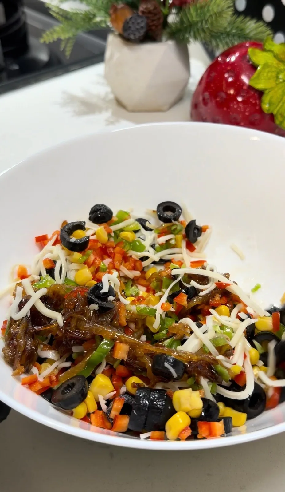 vegetable filling with peppers, corn, olives and grated cheese for potato flower cups