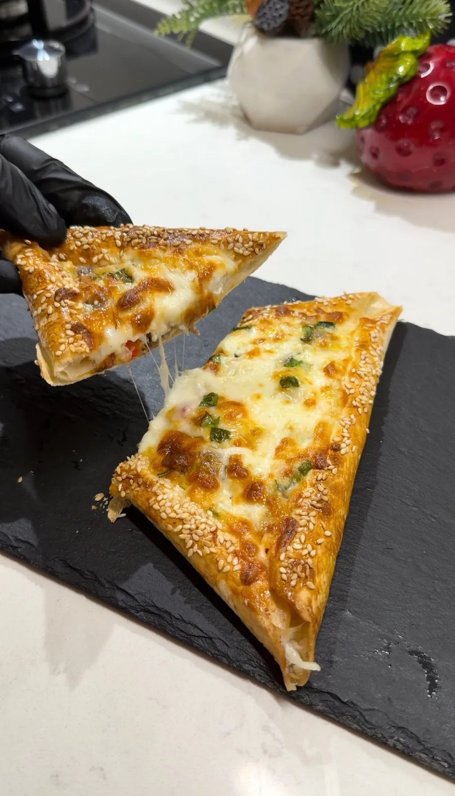 Baked lavash wrap with golden sesame crust and melted cheese filling