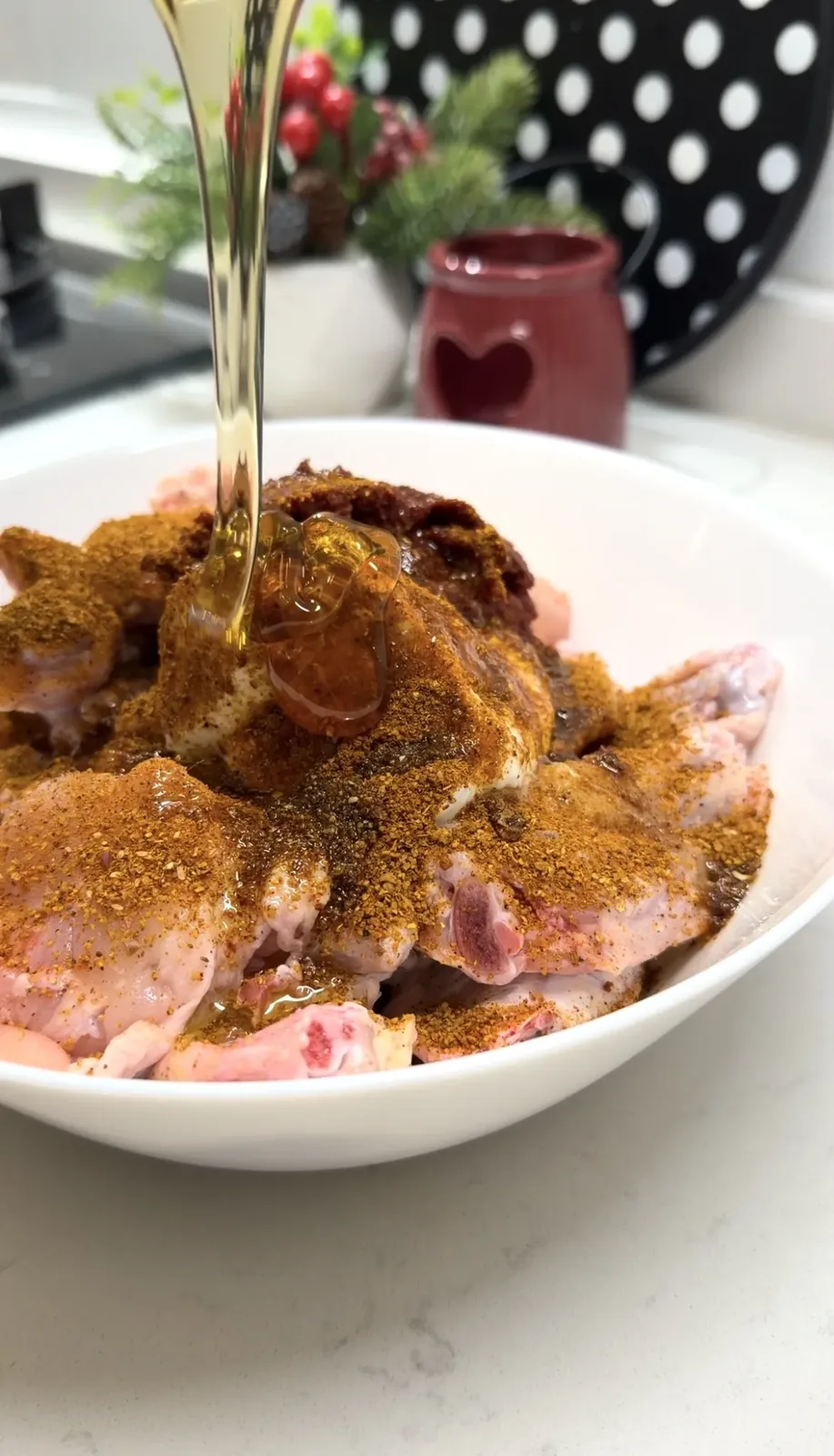 chicken wings coated with yogurt tomato paste honey and spice marinade