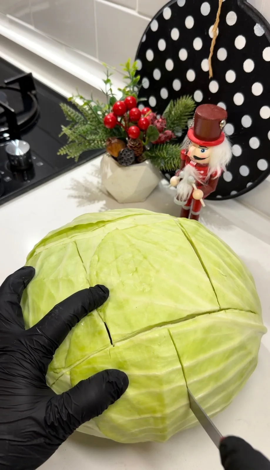 large cabbage being prepared for Turkish stuffed cabbage rolls