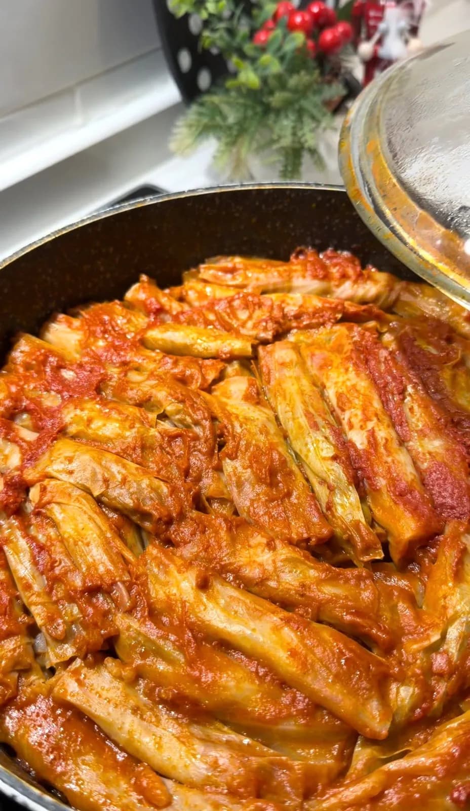 Turkish stuffed cabbage rolls in tomato sauce served with yogurt