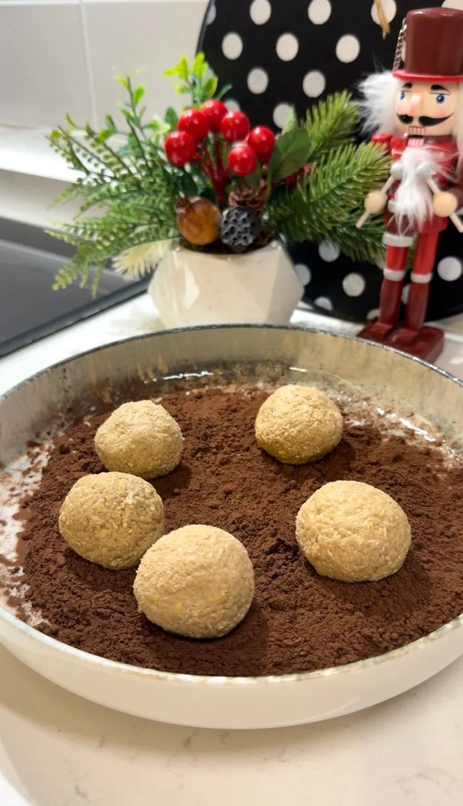 healthy tiramisu balls coated generously with cocoa powder
